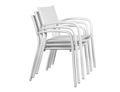 The image shows a stack of modern white chairs. The chairs have a minimalist design with a straight, thin backrest. The arms of the chair are curved and connected directly to the front legs, which are thin and straight.