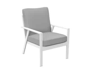 La imagen muestra un sofá moderno de una plaza con estructura de metal pintado en blanco y cojines en tonos neutros grises. El diseño es minimalista y funcional